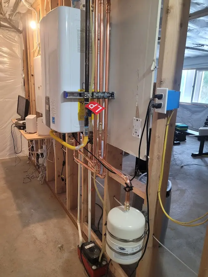 Licensed plumber repairing a kitchen sink in Virden